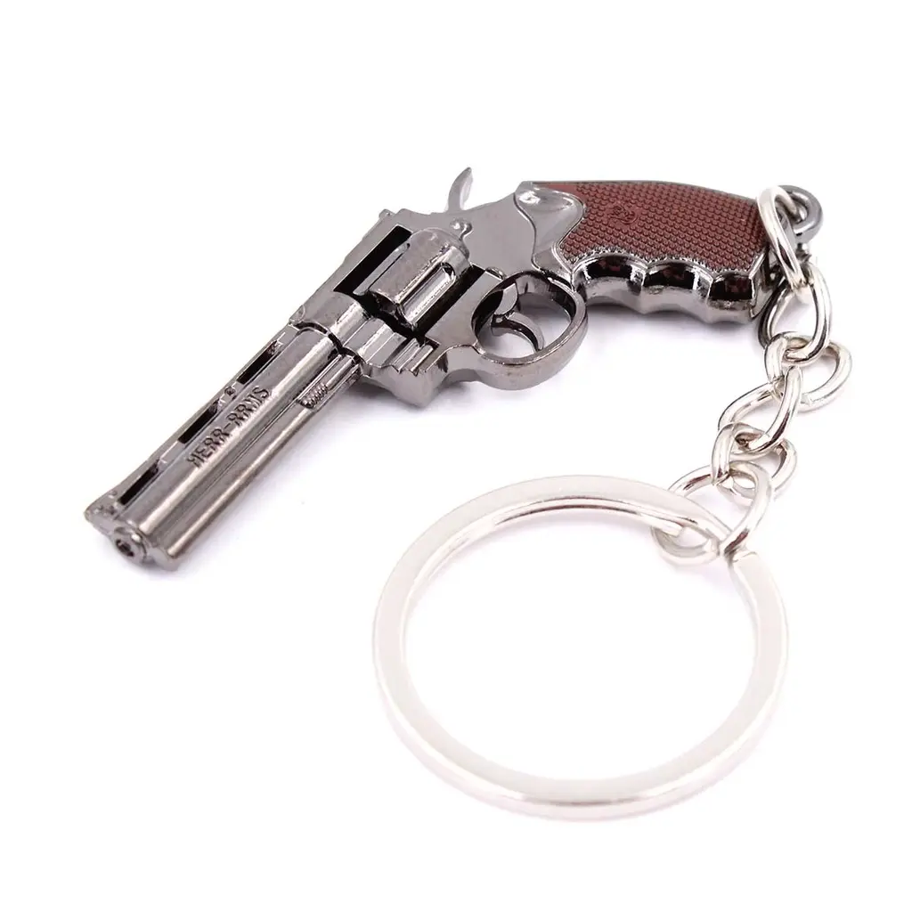 LLAVERO REVOLVER MG357 5 CM PLATA.webp